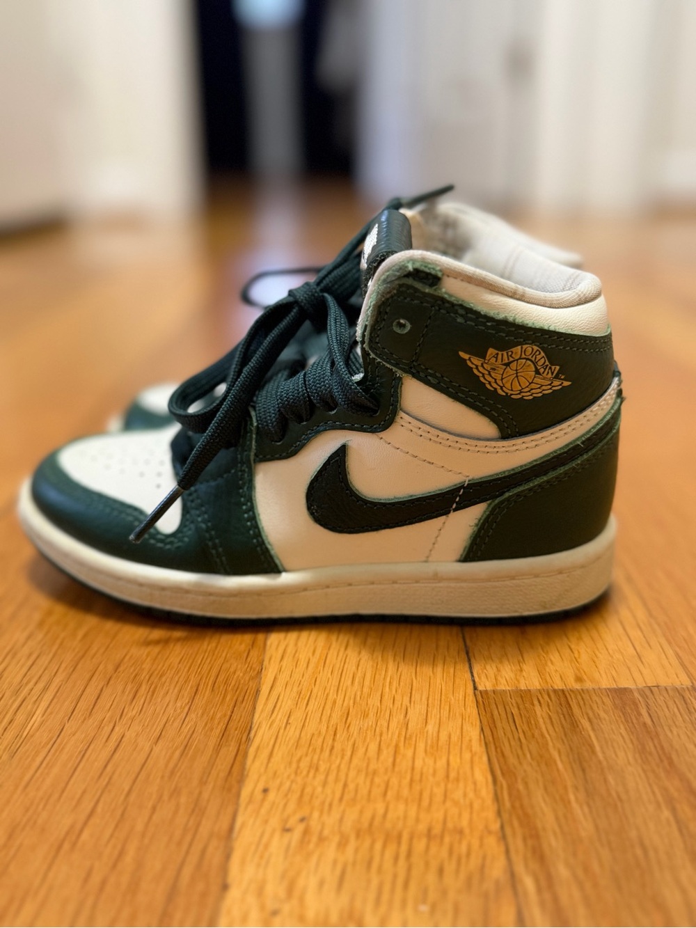 Nike Kids High-Top Sneakers in Green and White with Gold Logo